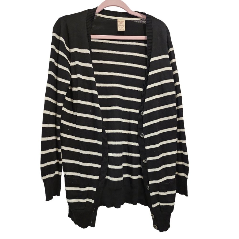 Black and white striped cardigan with button closure